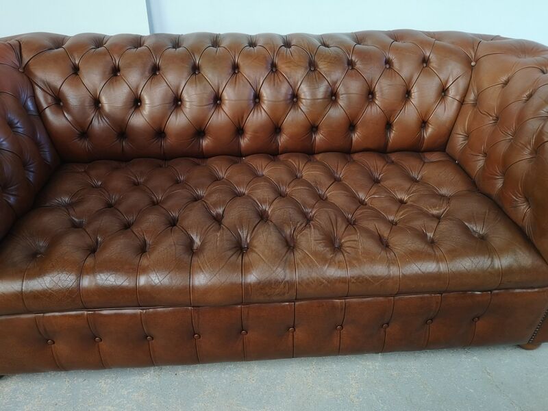 Light brown leather chesterfield sofa