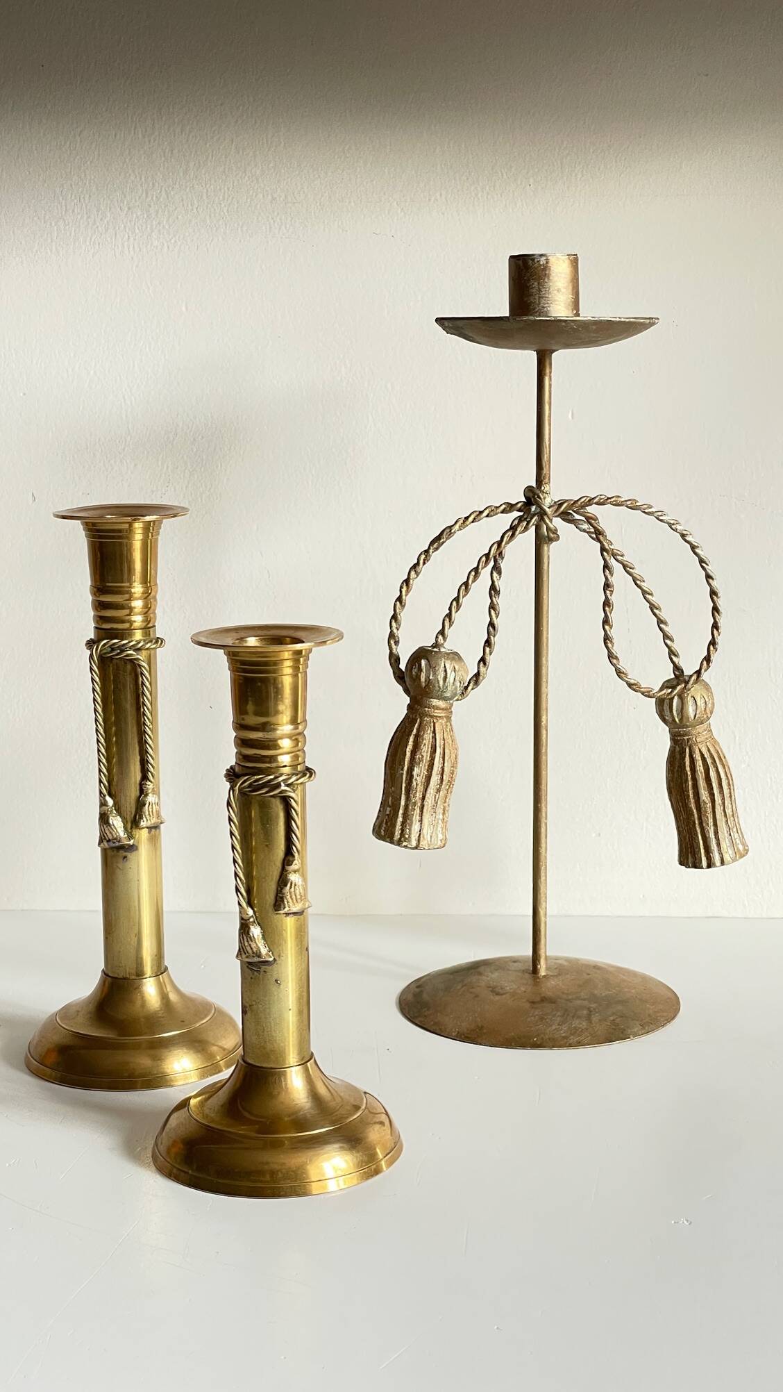 Trio of vintage knotted candlesticks brass