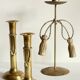 Trio of vintage knotted candlesticks brass