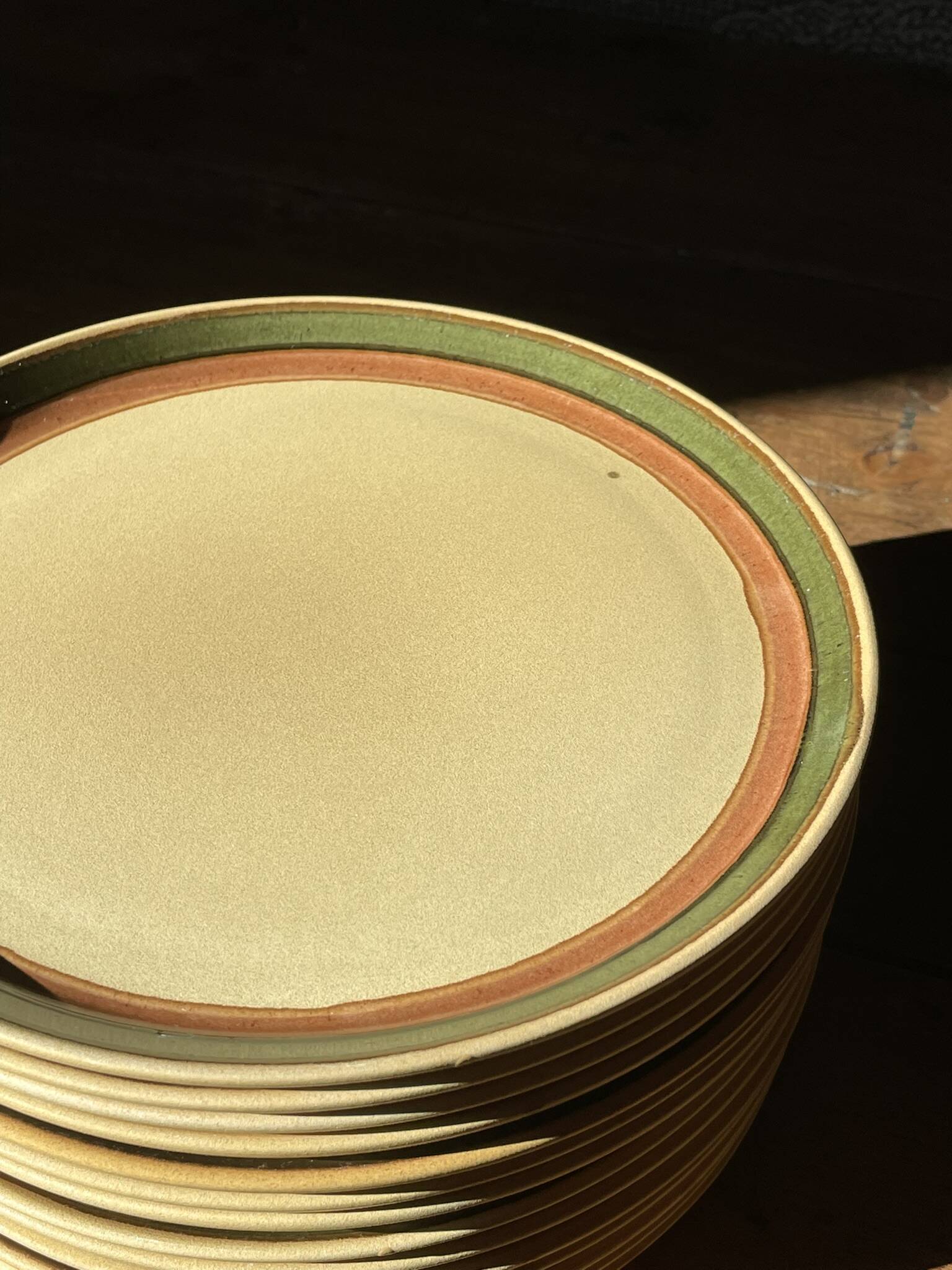 14 stoneware dinner plates, 1970