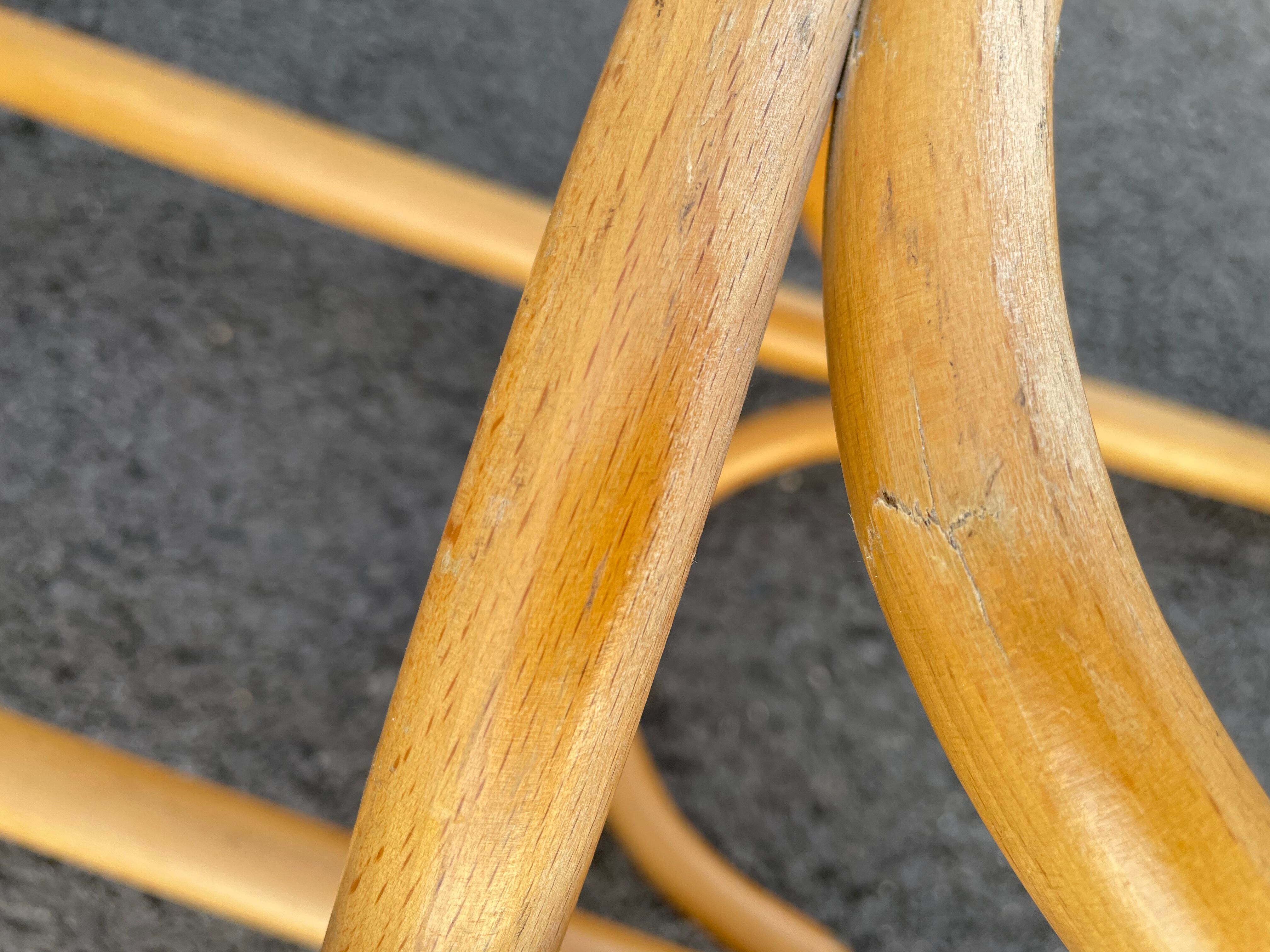 Curved wooden bar stool