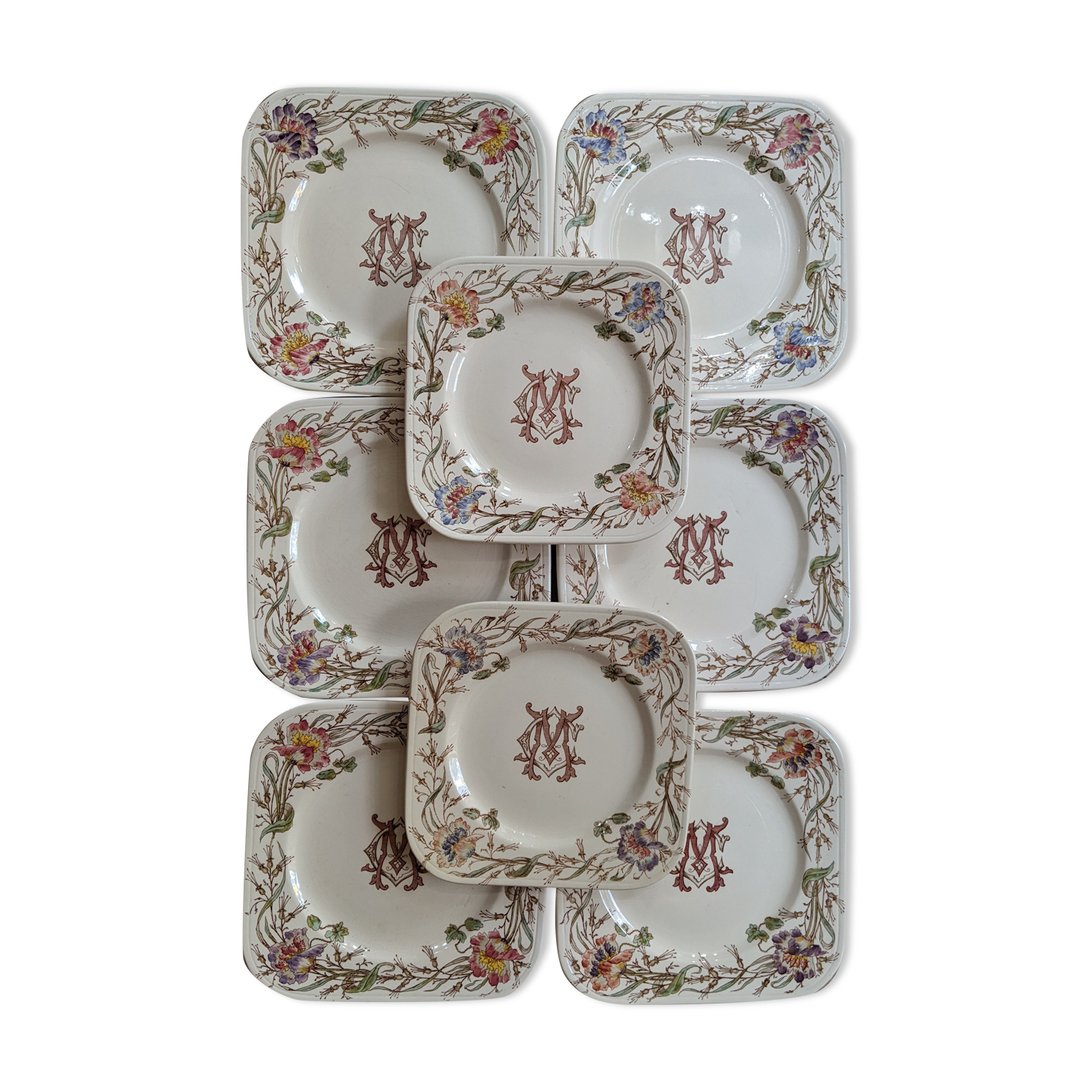 Série de 8 assiettes terre de fer Longchamp