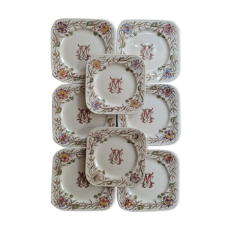 Série de 8 assiettes terre de fer Longchamp