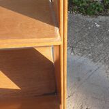 Magazine rack with sliding drawers in light wood, Scandinavian style.