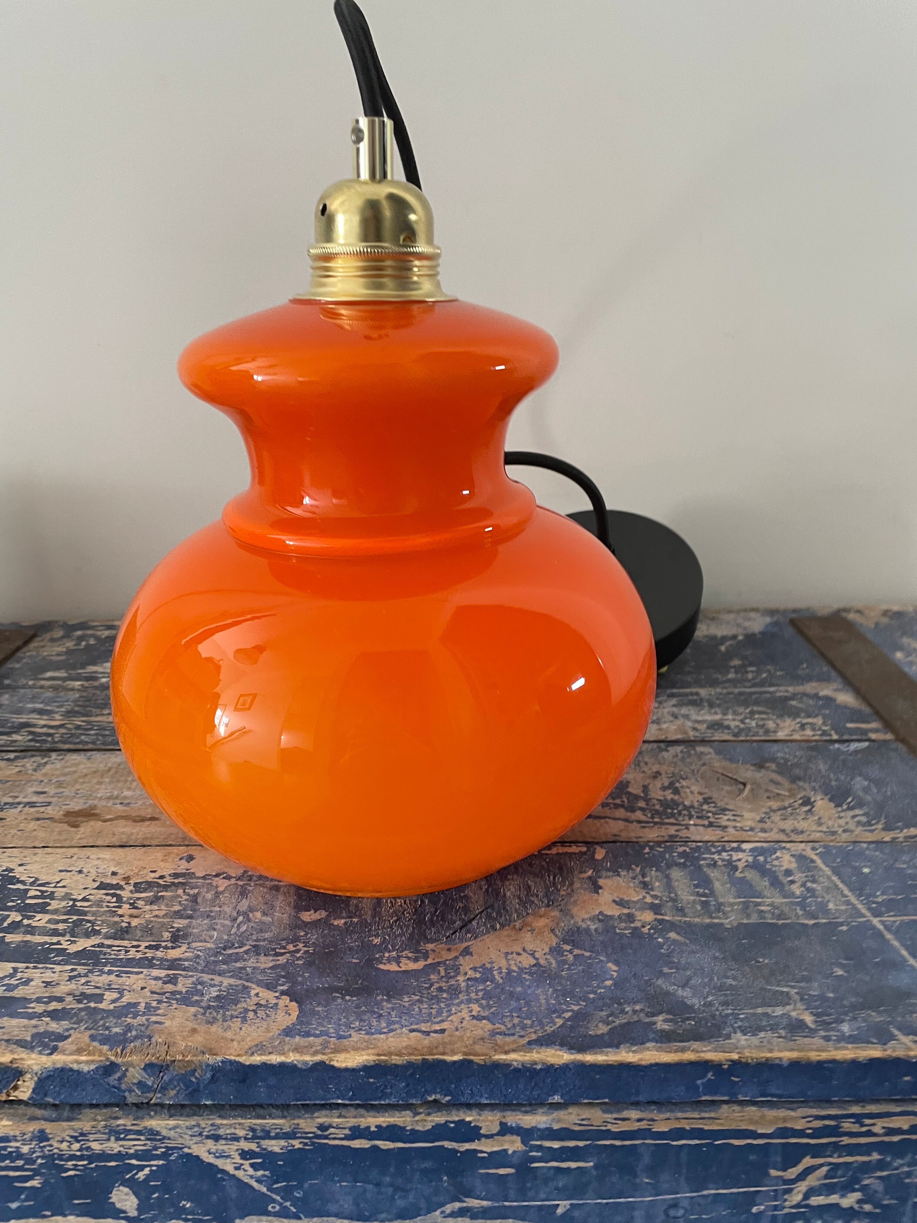 Vintage pendant lamp in electrified orange opaline to nine