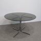 70s round table with smoked glass and chrome