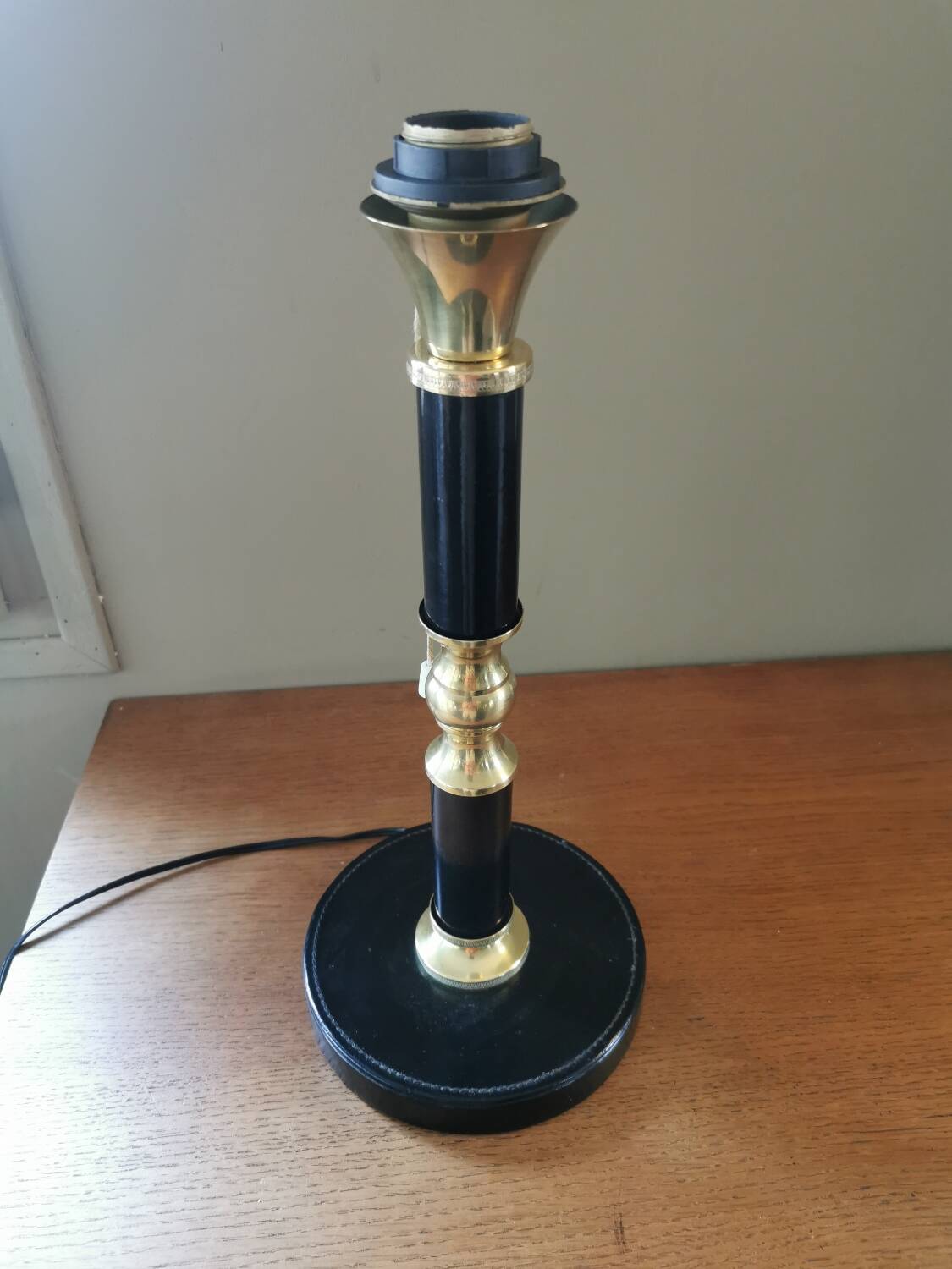 Vintage lamp base in black leather and brass