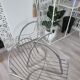 A pair of space age wire chairs