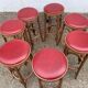 Lot de 7 tabourets de bar en bois courbé assise skaï rouge