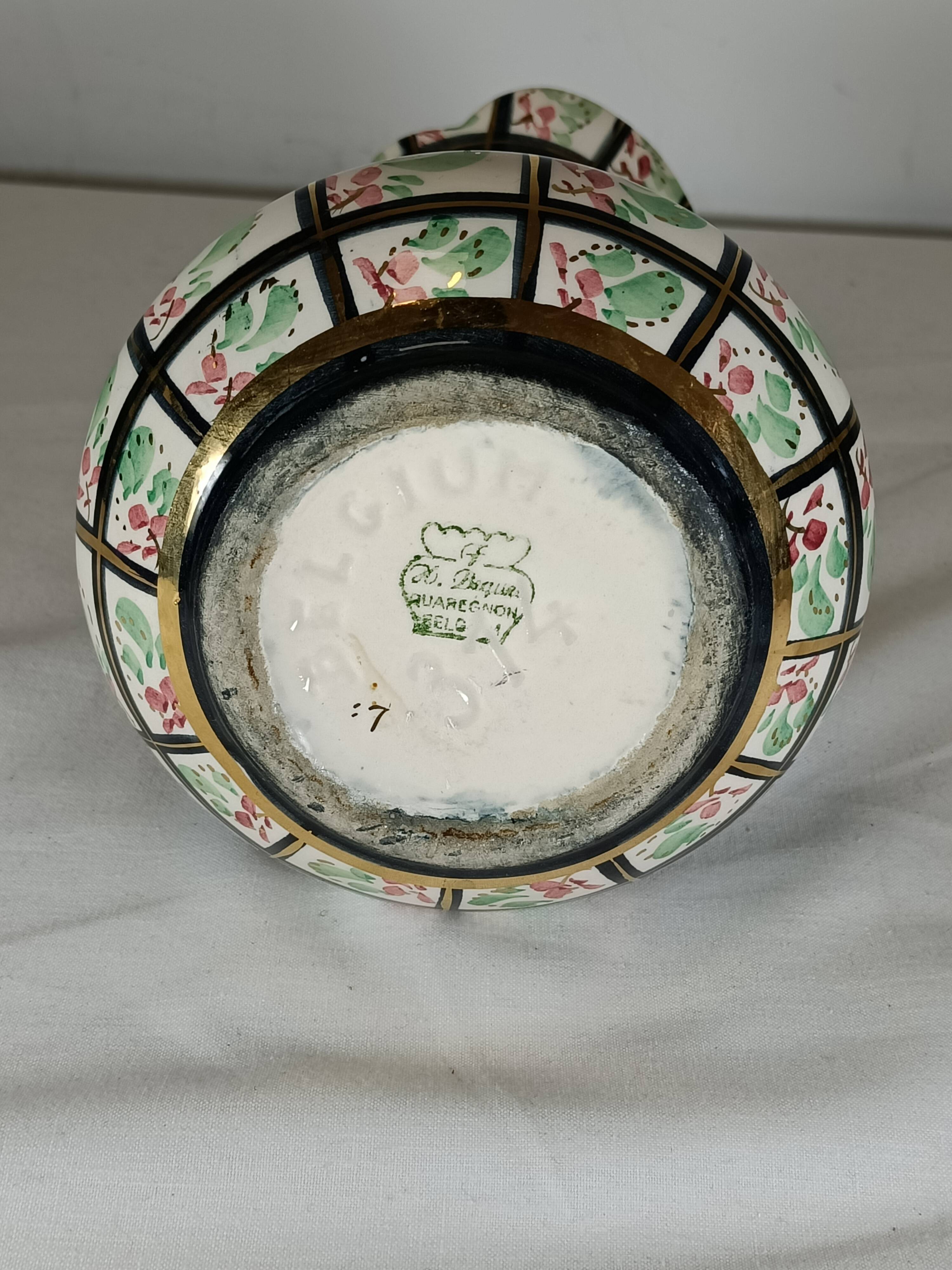 Aiguière ancienne en faïence décor floral – XIXe siècle