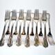 Series of 12 table forks in silver metal ercuis rocaille