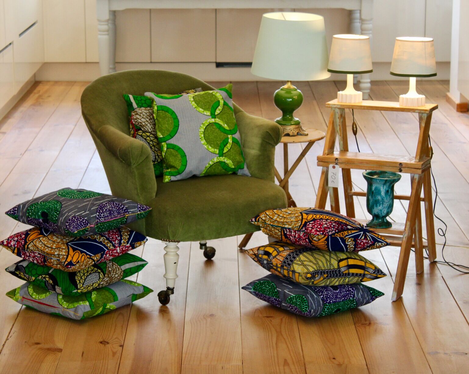 Toad in almond green velvet armchair on castors
