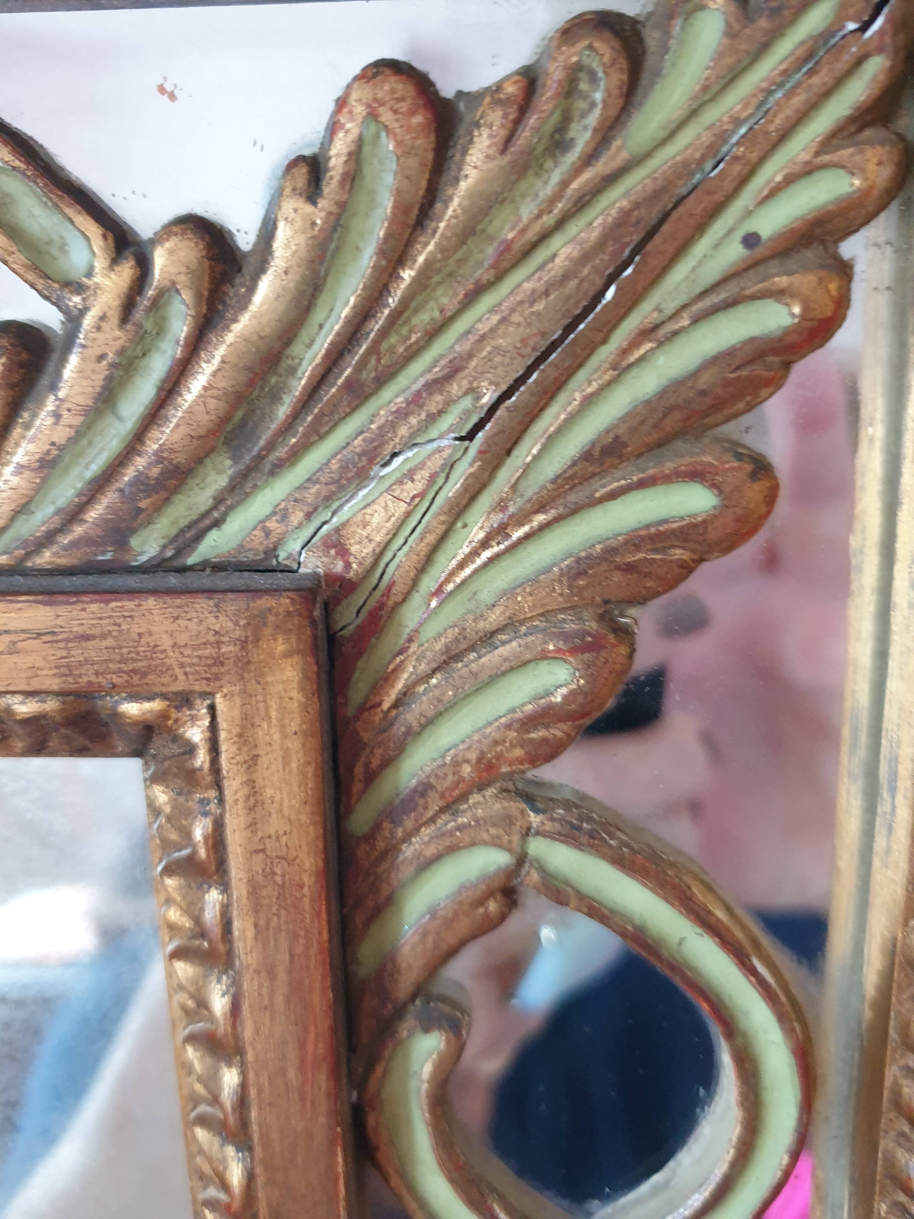 Classic antique mirror in gilded wood