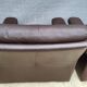 Pair of chocolate leather lounge chairs