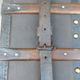 Old wooden and leather trunk, old brass nail trunk and leather strap