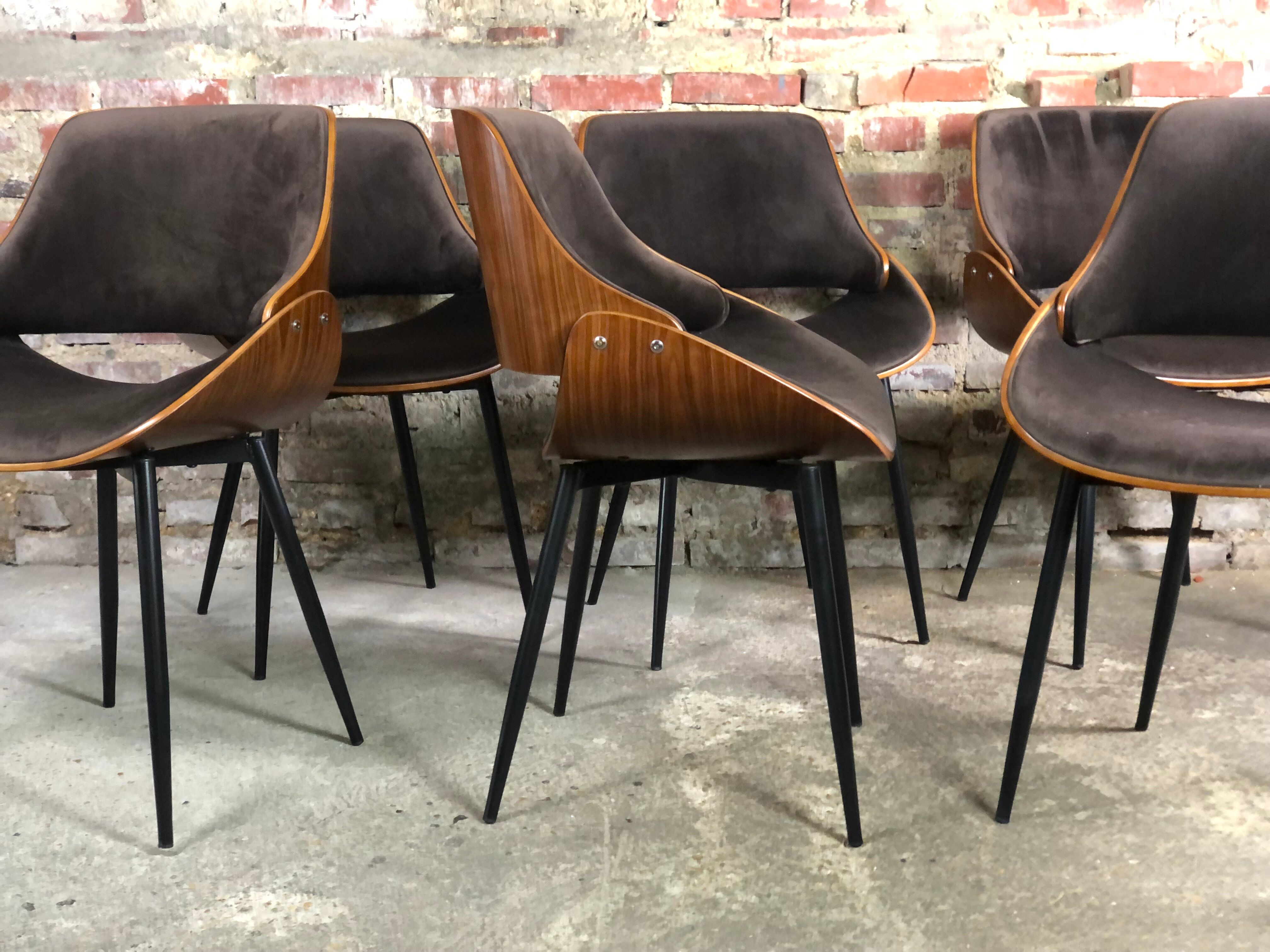 Scandinavian style chairs in curved plywood covered with brown fabric