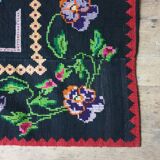 Vintage wool rug with floral design in sweet colors