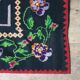 Tapis en laine vintage avec un design floral dans des couleurs douces