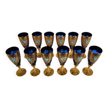 12 cobalt blue and gold Murano glass flutes, mid-20th century.