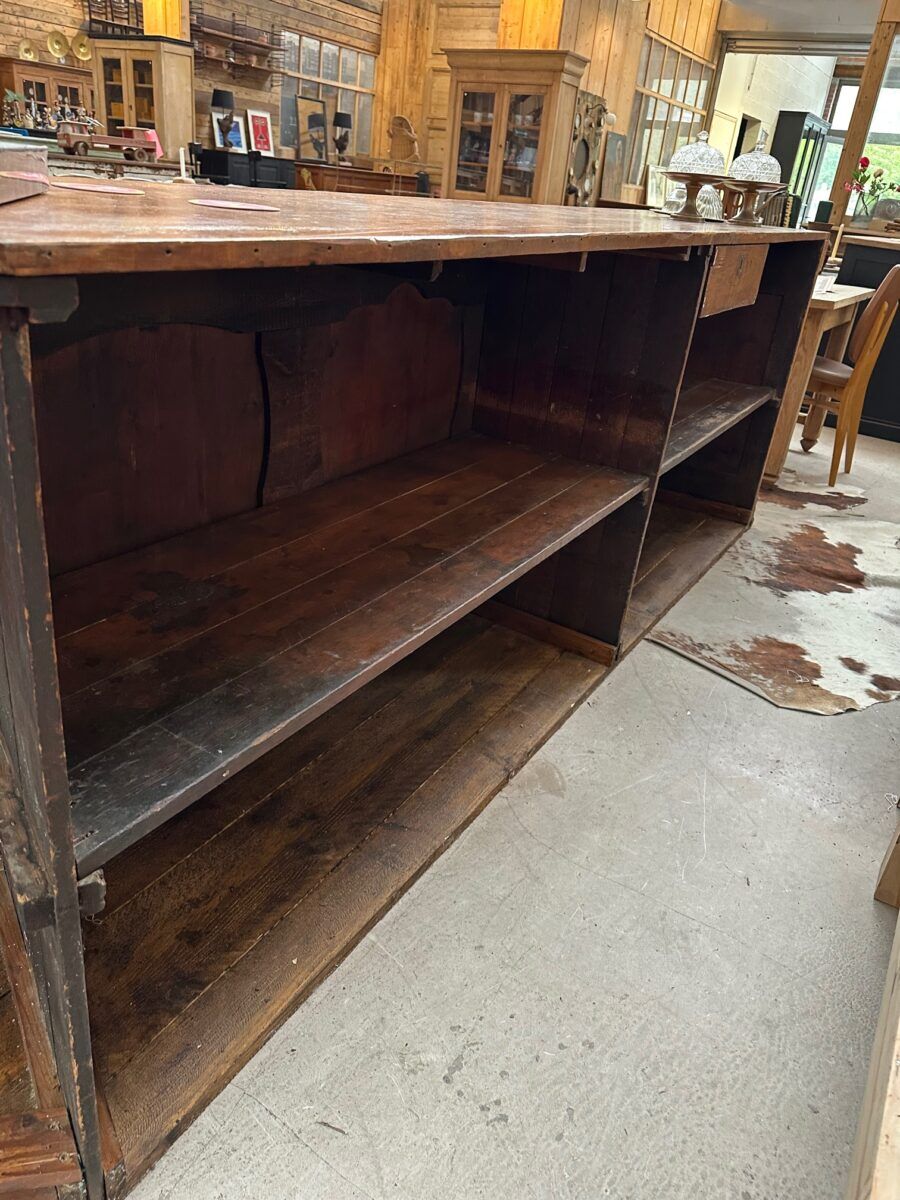Large corner bar counter from the late 19th century.