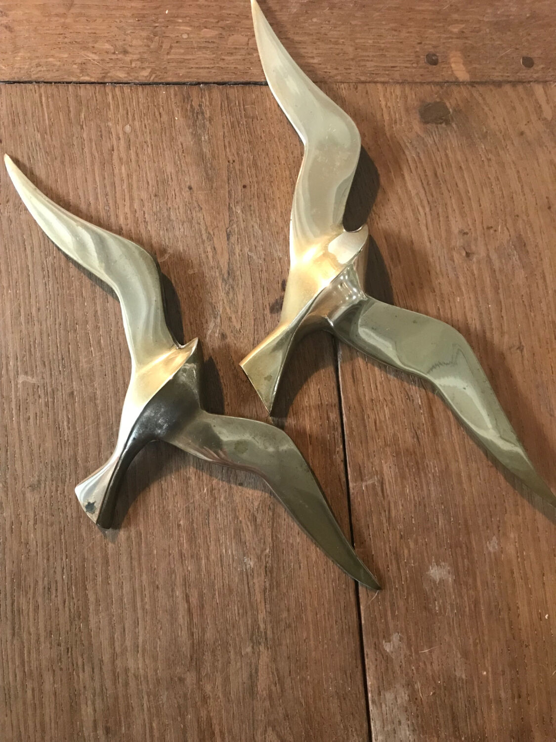 Pair of brass swallows