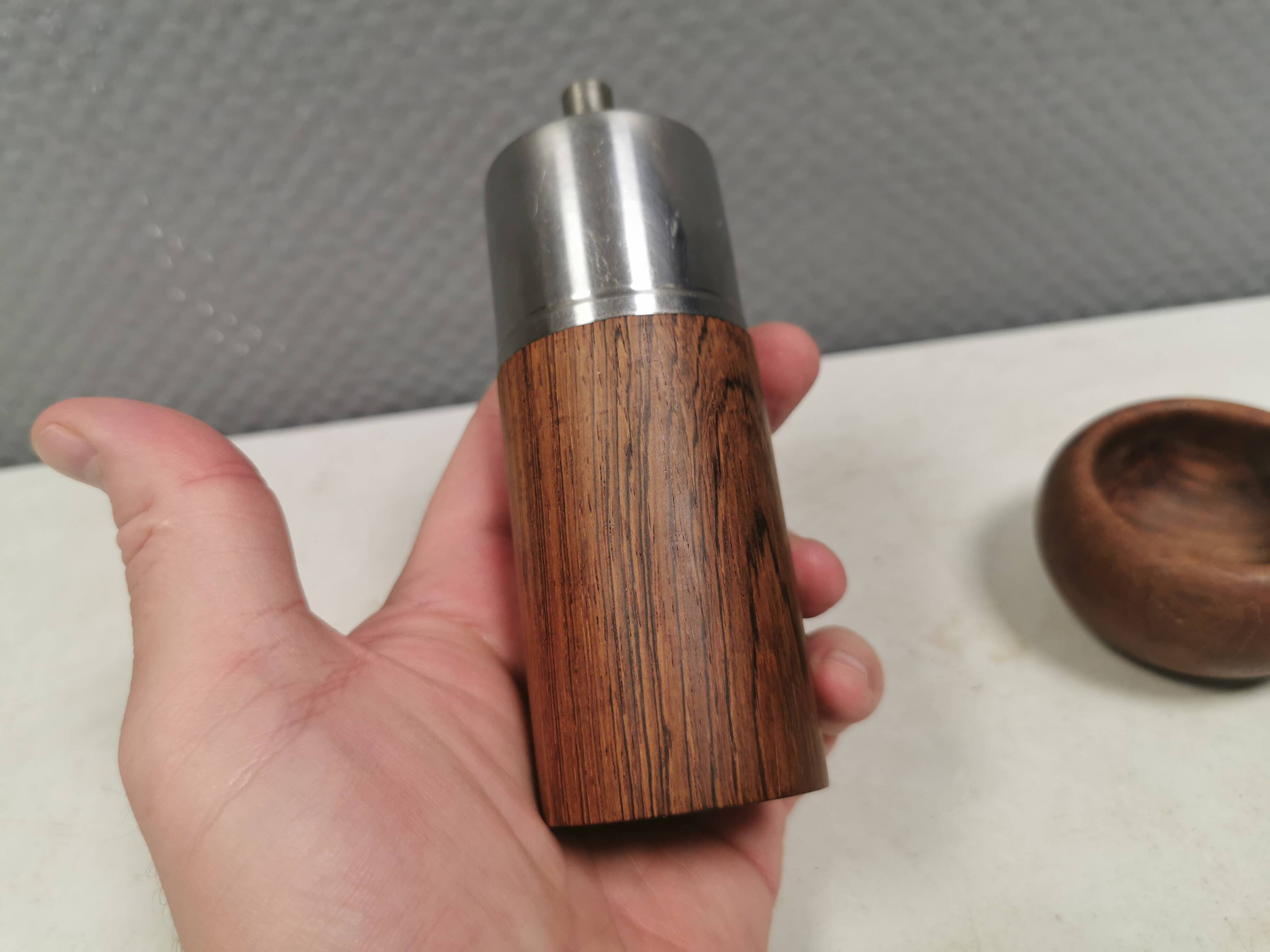 A salt shaker and a pepper mill in teak, made in Denmark 1960-70s