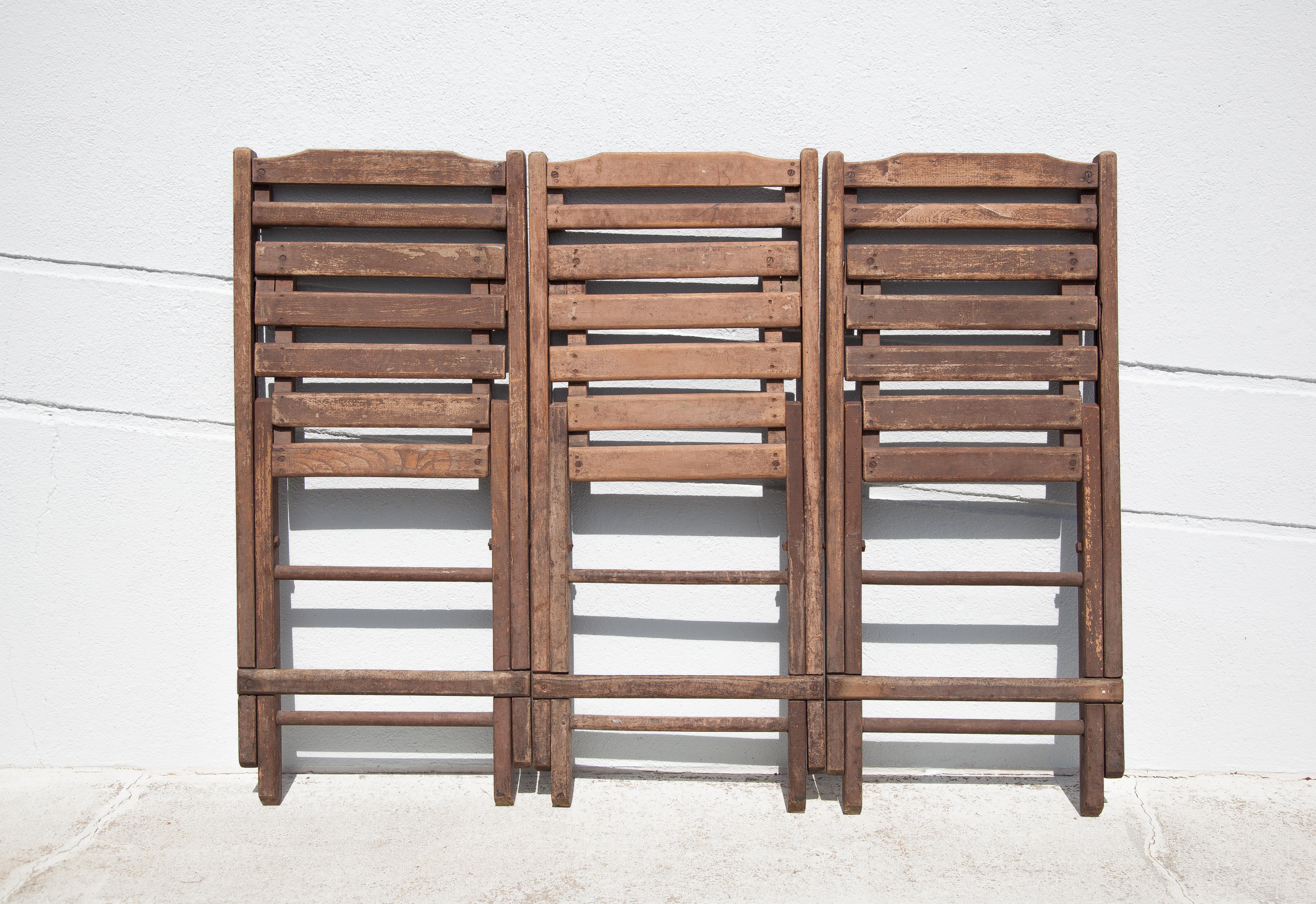 Set of 3 wooden folding chairs