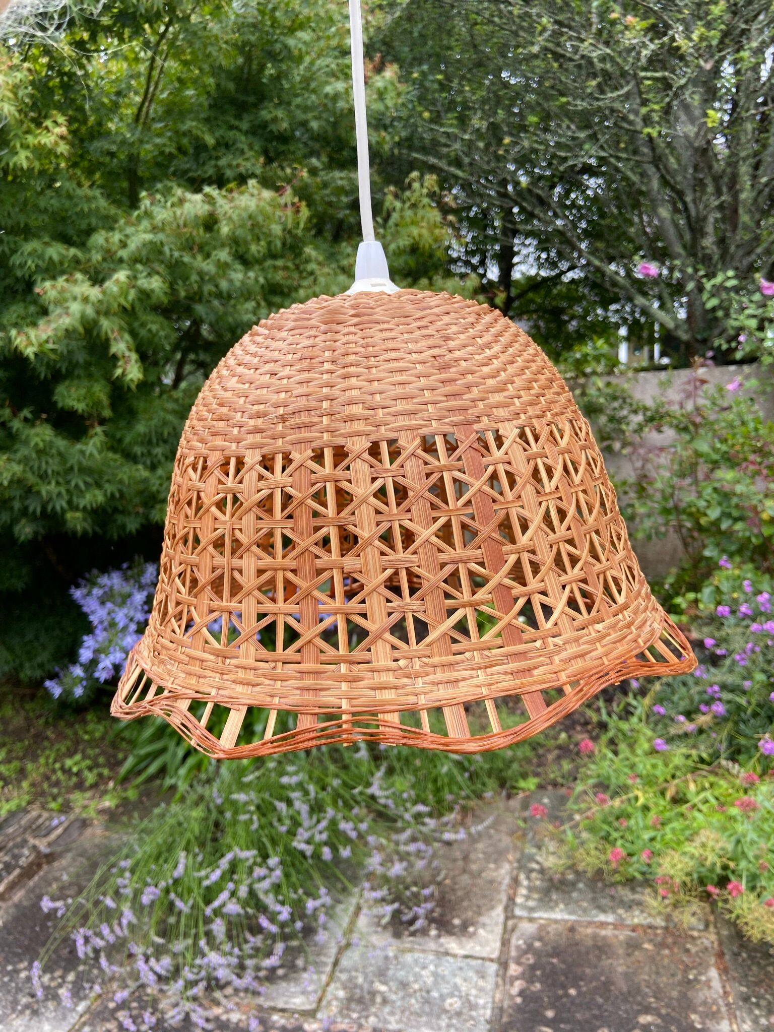 Suspension in rattan and vintage wicker bell shape