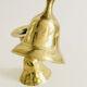 Pair of brass "bell" candle holders
