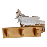 Vintage wall coat rack in pine with 3 hooks.