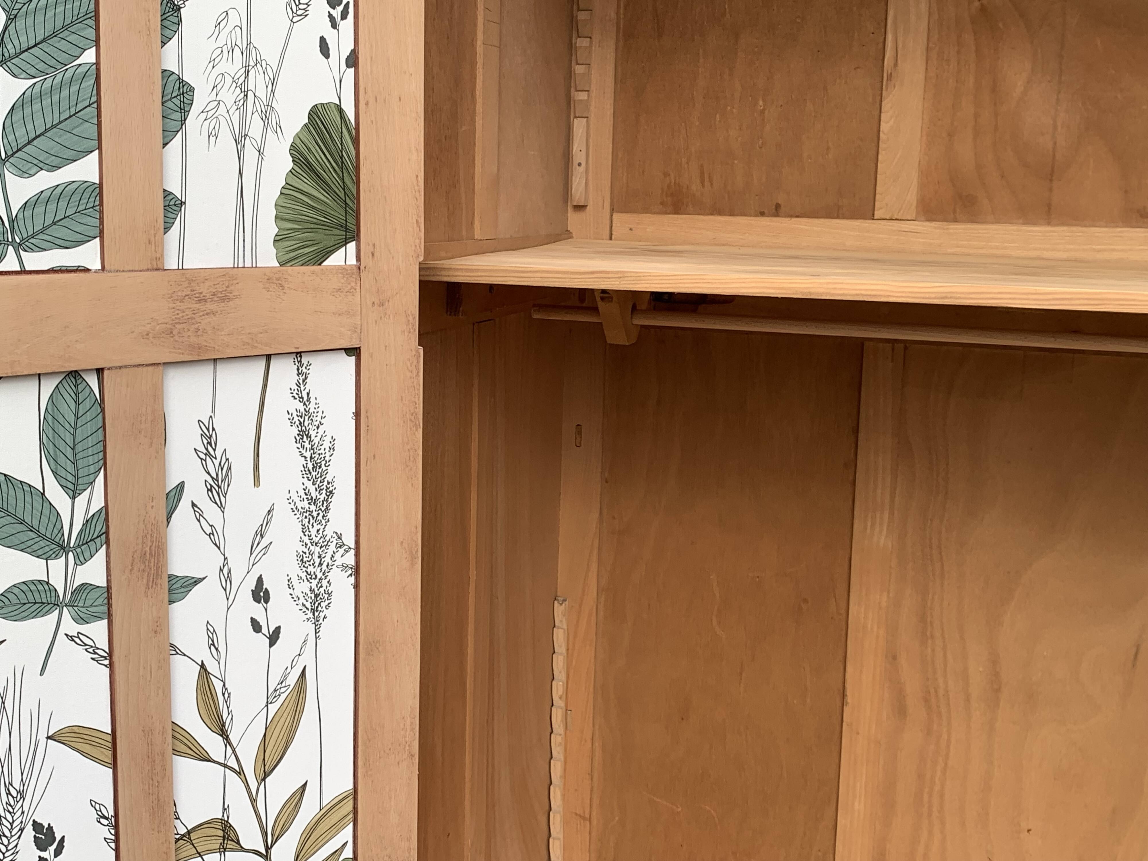 Parisian paneled cabinet in raw wood, 1940