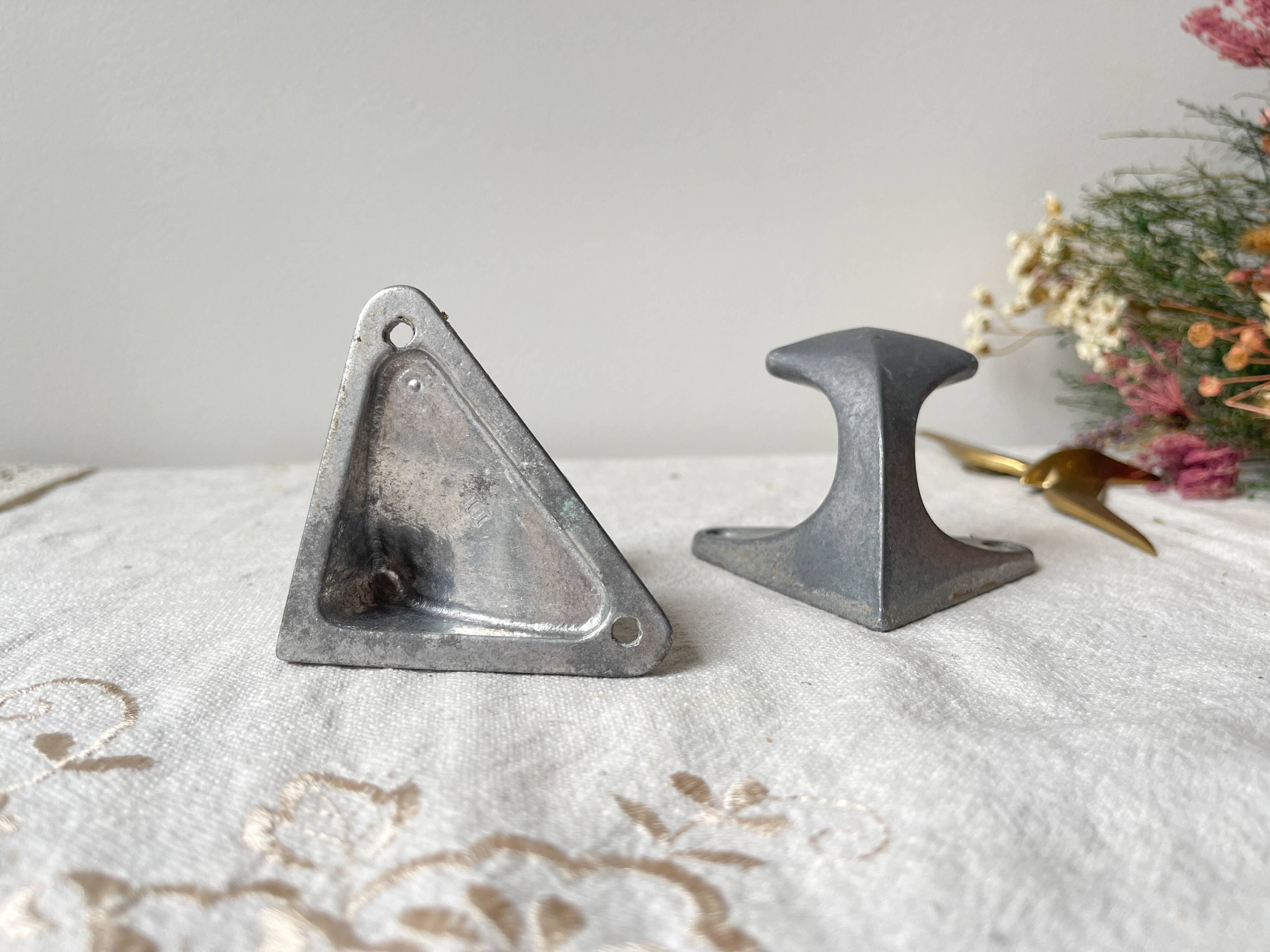 Vintage cast aluminum wall hooks