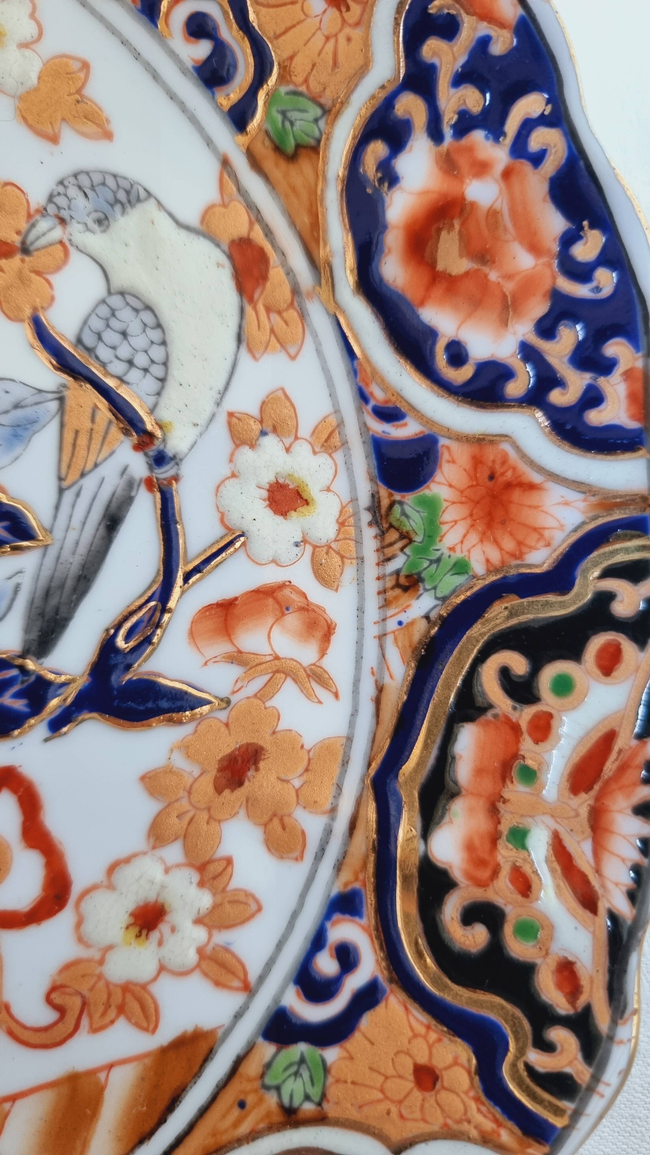 Imari-style porcelain plate, hand-painted, Japan, mid-20th century.