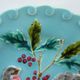 Blue barbotine plate of Sarreguemines: Birds pecking with holly