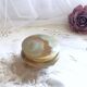Small round box in green marbled onyx tripod lion paws brass