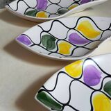 Three vintage free-form ceramic ravine dishes from the 1950s