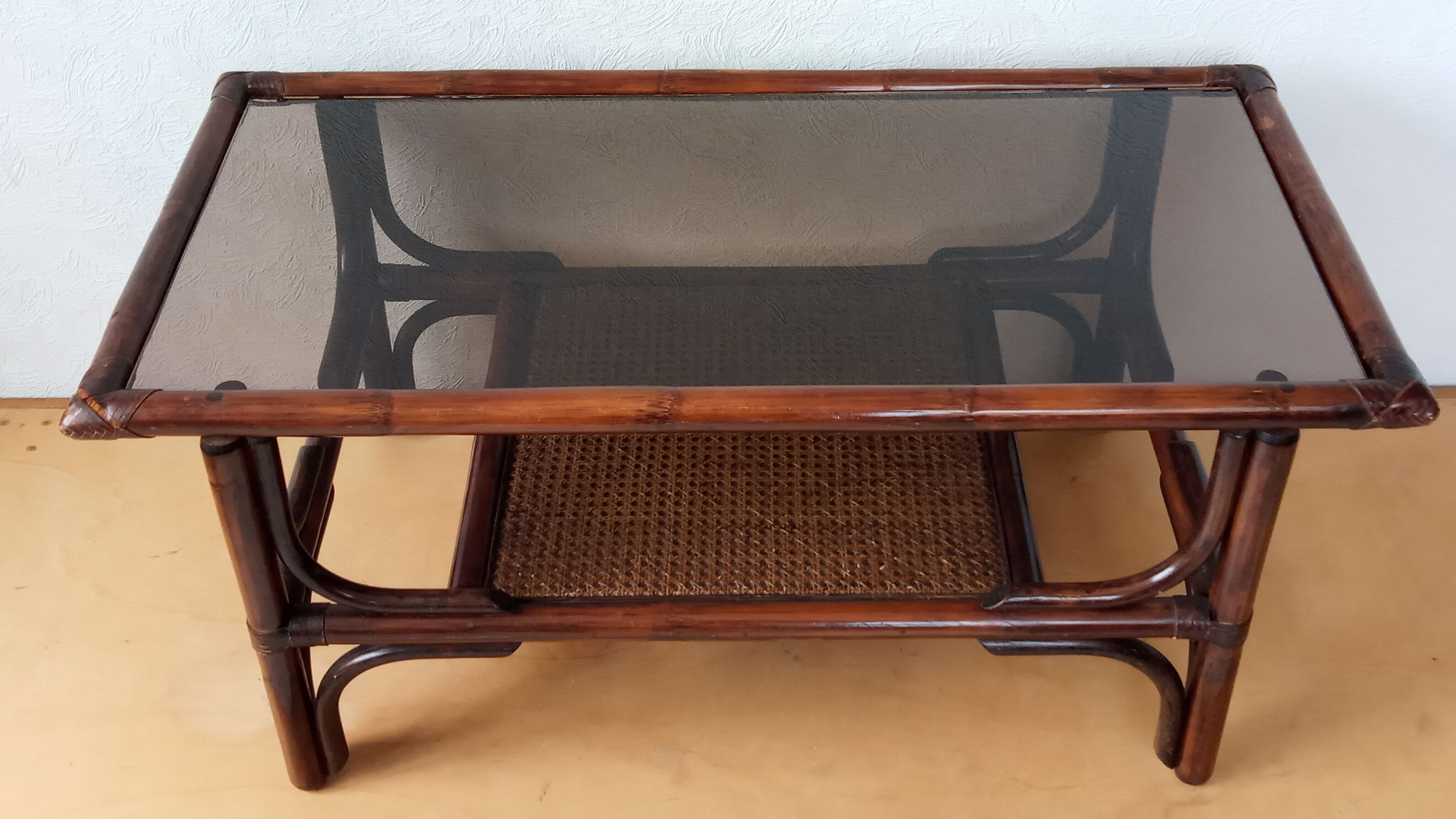 Vintage rattan coffee table and smoked glass