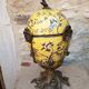 Large covered box in yellow earthenware with polychrome enamels and brass from the 20th century.