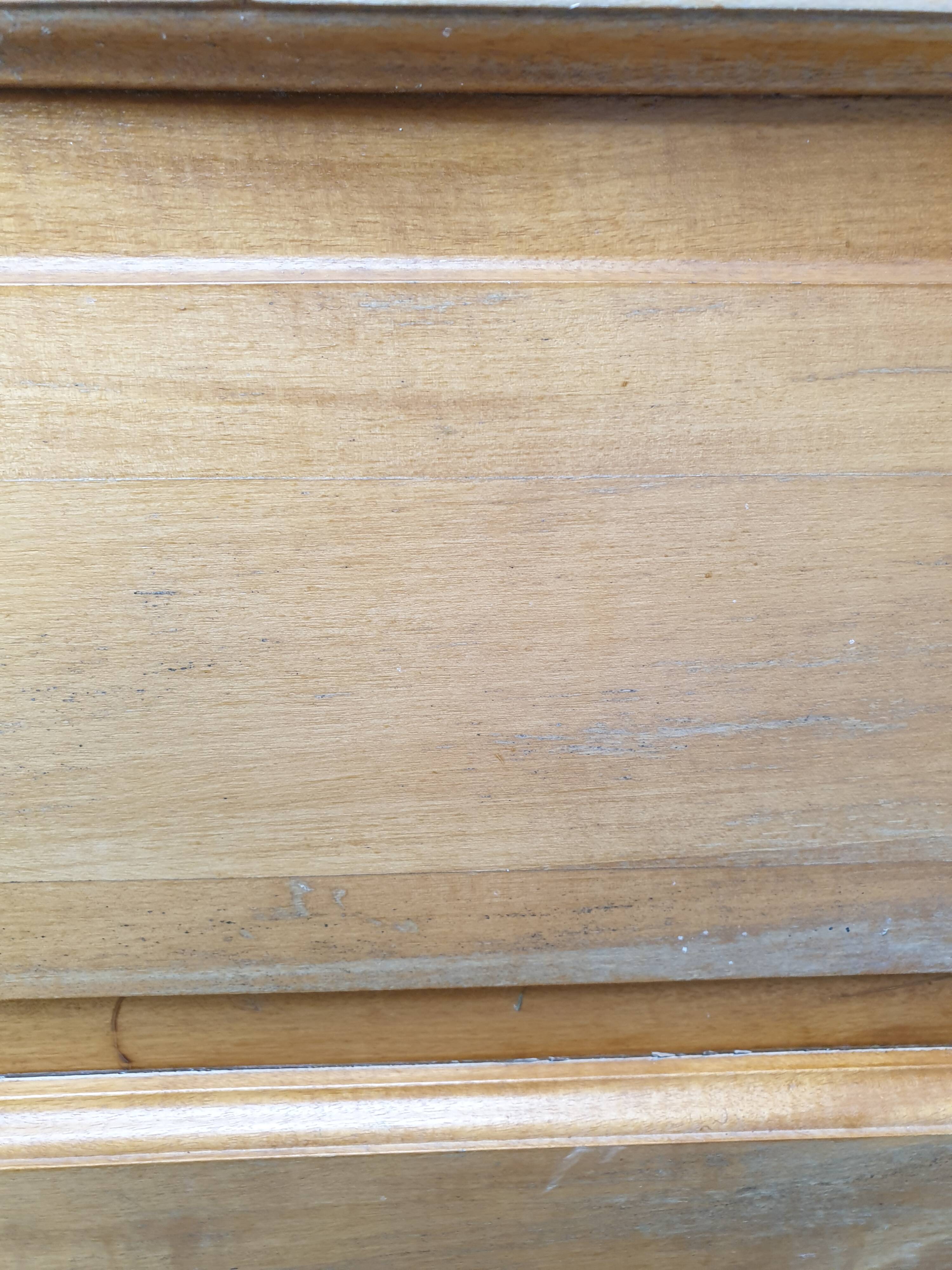 Old wooden door glazed with small tiles