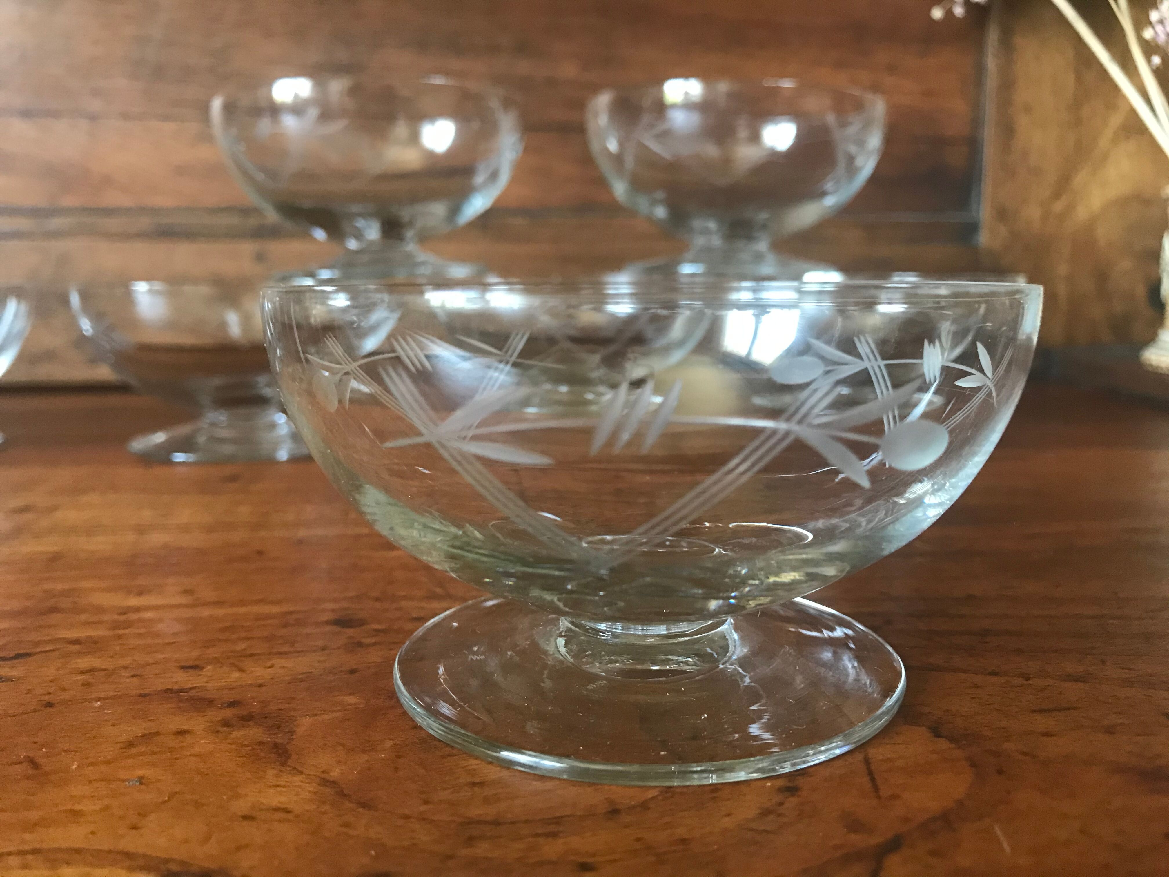 Set of eight engraved crystal champagne glasses
