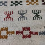 Handmade rugs in natural wool with traditional patterns