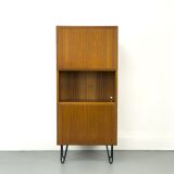 Narrow teak bookcase with two doors by Omann Jun, 1970s