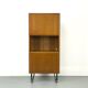 Narrow teak bookcase with two doors by Omann Jun, 1970s
