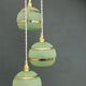 Suspension triple vintage glass globes in frosted green and gold.