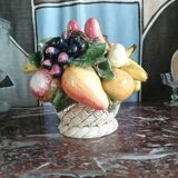 Basket with ceramic fruit decoration