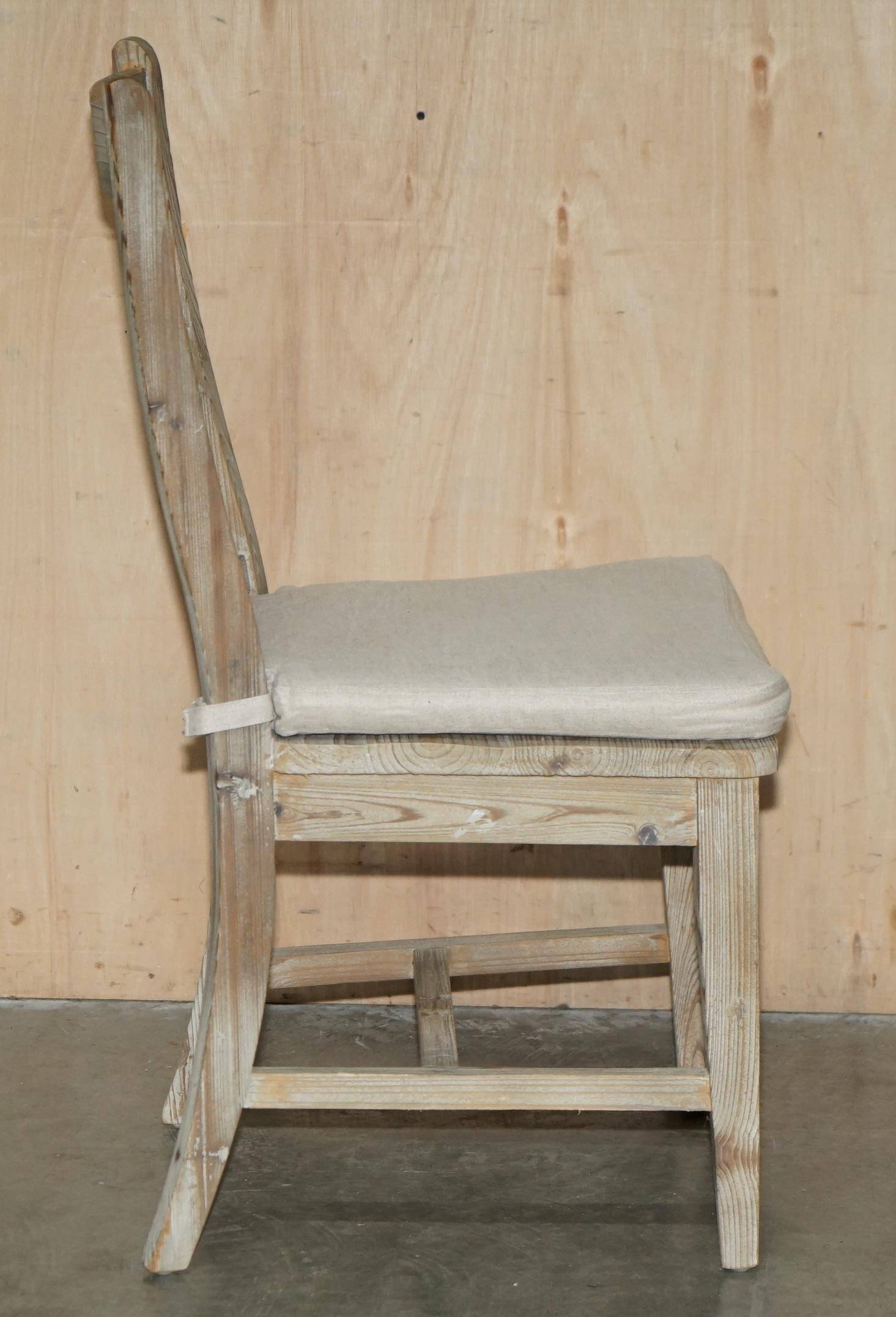 Pair of Swedish-style accent chairs in recycled pine with upholstered seats.