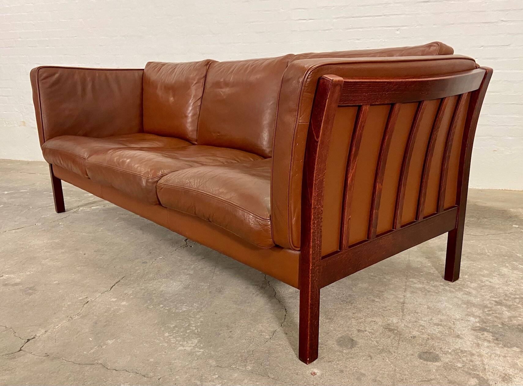 Vintage danish stouby dark cognac leather and rose stained beechwood frame 3 seater sofa