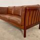 Vintage danish stouby dark cognac leather and rose stained beechwood frame 3 seater sofa