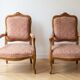 Pair of cabriolet armchairs in Louis XV style in light walnut.