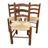 Brutalist chairs in walnut and straw